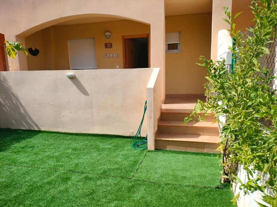 Bajo Con Jardin A Pie De Playa Y Piscina Comunitaria Con Jacuzzi Leilighet Playas de Vera Eksteriør bilde